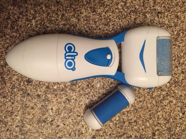 Clio foot machine looks like a bigger version of a razor and has a little attachment with foot-file sandpaper on it that spins when you power it on