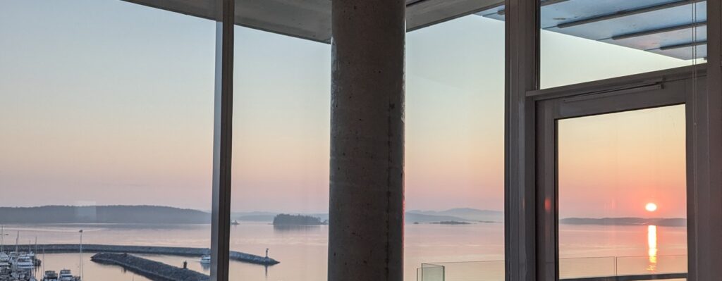 A bit of a view of the yacht club and the sunrise out the condo windows.