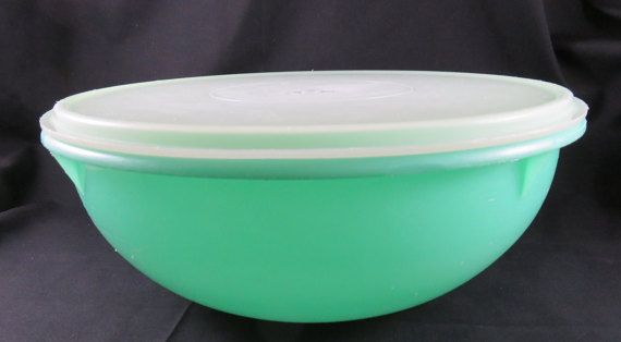 large green tupperware bowl with a white lid