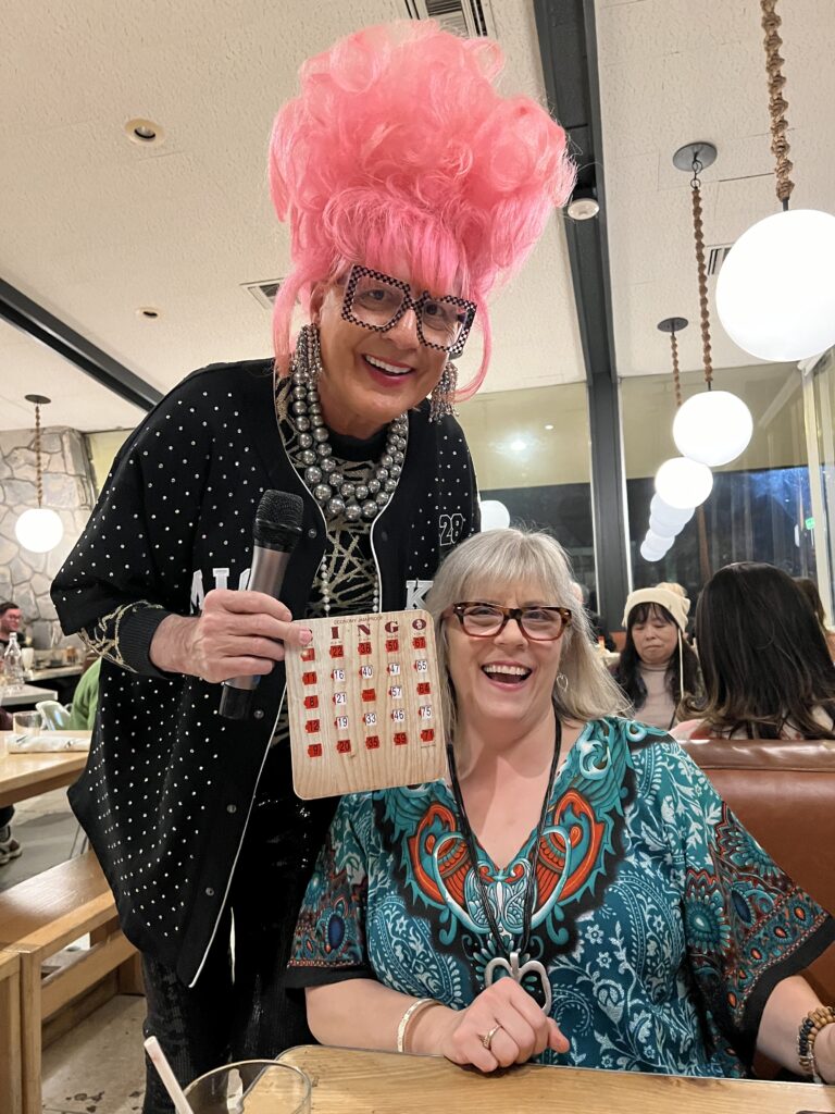 Drag queen Bella da Ball congratulates me on my bingo!