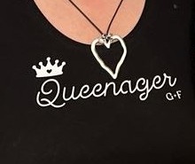 Black tee with the Queenagers image and a G and F pendant showing